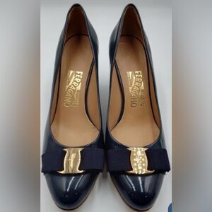 Salvatore Ferragamo Navy Heels with Gold Bow Accent Size:7